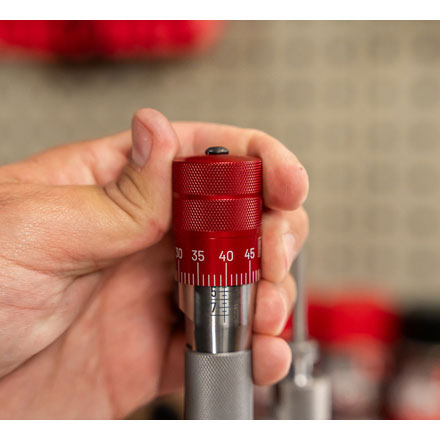 Two Hornady Click-Adjust Bullet Seating Micrometers with FREE Hat and Magazine